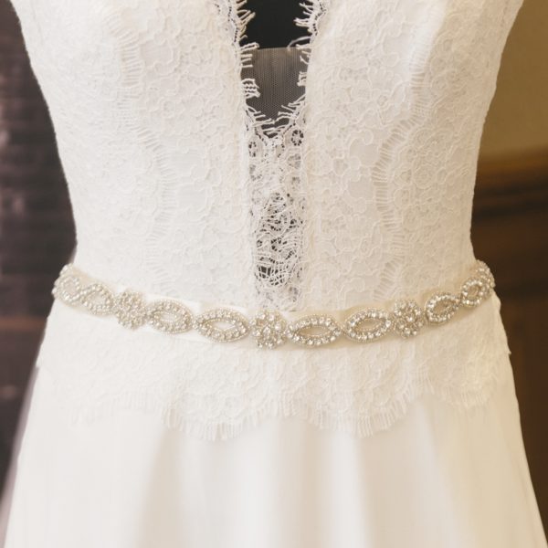 lucy wedding belt sash on wedding dress on mannequin