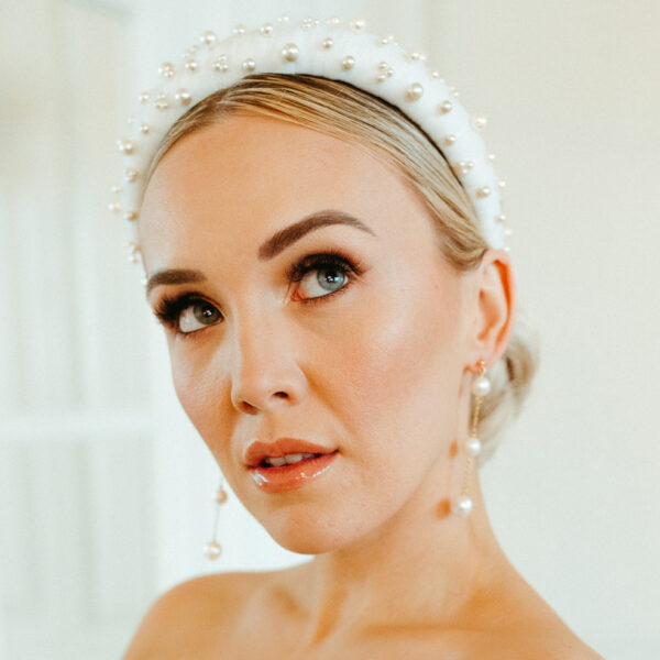 Peace Pearl Earrings on model
